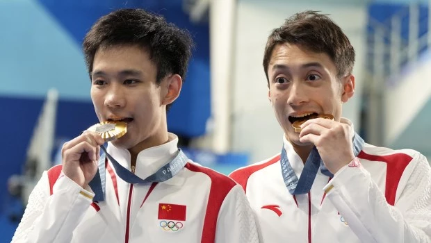 Los chinos Lian Junjie y Yang Hao campeones olímpicos en saltos sincronizados